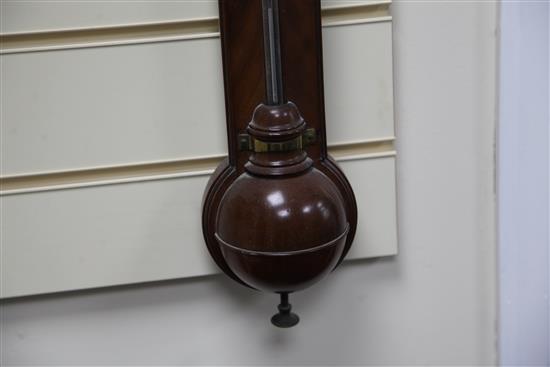 Dollond of London. A George III mahogany stick barometer, 40in.